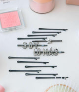 BETER | Clips Planos Negros Frases Wonder (13 unidades) - InternationalCosmetic